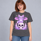 Illustrative mockup of a young adult woman wearing the Charcoal Lavender Bat Cat Tee with blue jeans on a gray studio background